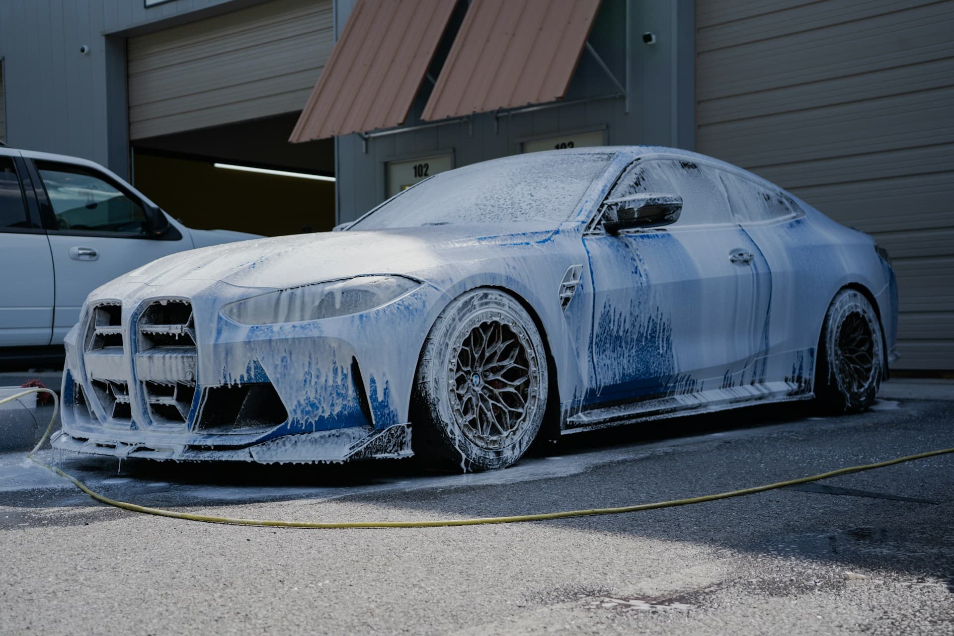 Blue coupe interior and exterior wash — Midtown